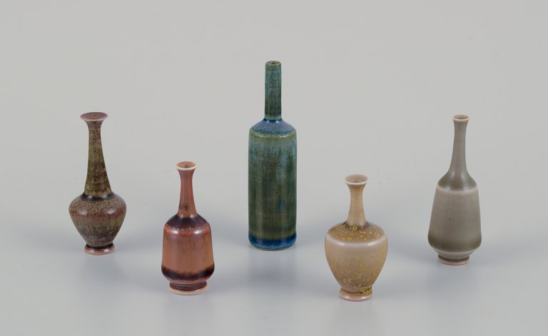 John Andersson for Höganäs, Sweden.A set of five unique miniature ceramic vases in various shapes and glazes.