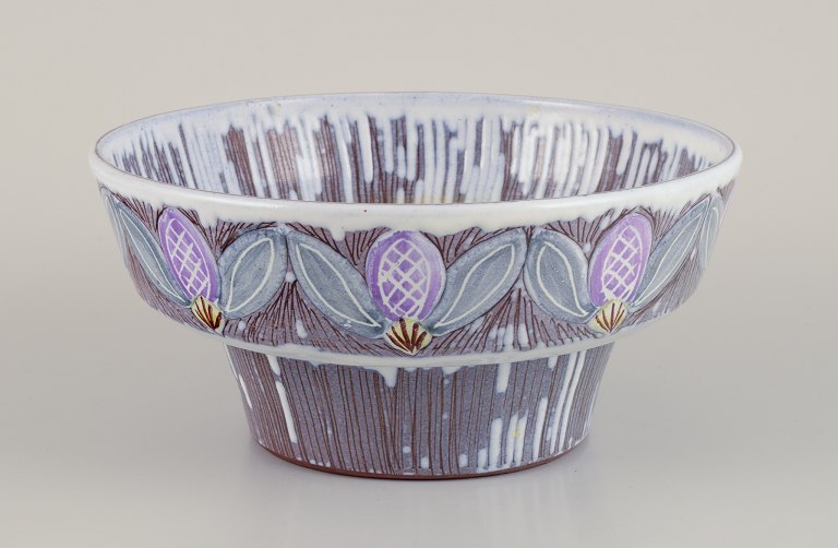 Olof Larsson for Laholm, Sweden. Ceramic bowl with polychrome glaze and floral motifs.