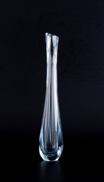 Nils Landberg for Orrefors, Sweden. Tall and slender art glass vase in clear glass.