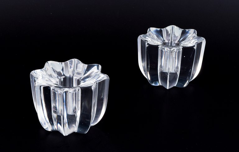 Sven Palmqvist for Orrefors, Sweden. A pair of low art glass candle holders in crystal glass.