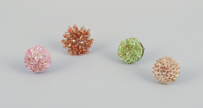 French jewelry artist. Four designer rings in metal and plastic.Flower designs.