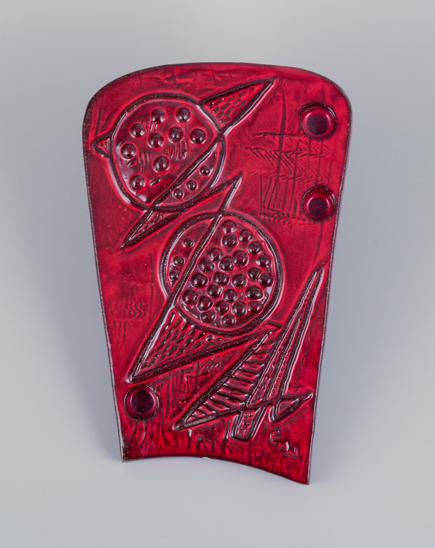 Ester Wallin (1928-2009) for Upsala Ekeby, Sweden.Stoneware wall relief with an abstract motif. Glazed in red hues.