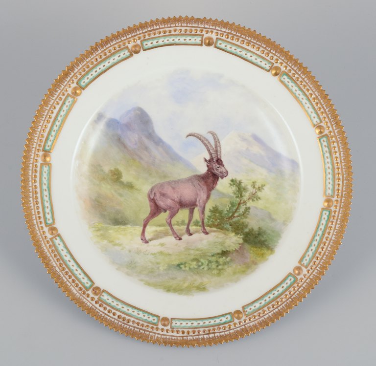 Royal Copenhagen Fauna Danica dinner plate with a motif of an ibex in a landscape. Hand-painted.