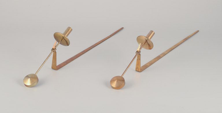Skultuna, Sweden. A pair of wall-mounted candle sconces in brass.Designed by Pierre Forsell in the 1970s.
