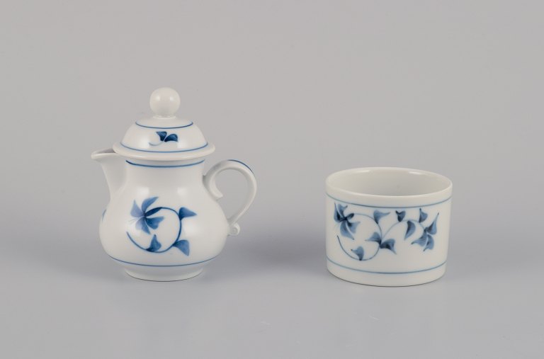 Gertrud Vasegaard for Royal Copenhagen "Noblesse."Small lidded milk jug and a sugar bowl.