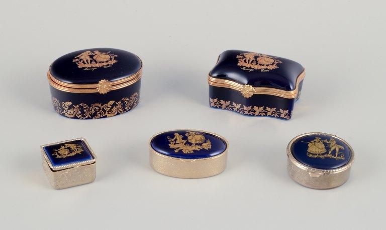 Limoges, France. Five miniature porcelain boxes, two with brass mounts, decorated with 22-karat gold leaf and a beautiful royal blue glaze. Scène galante.