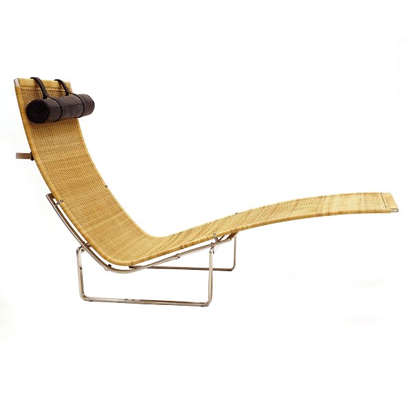 Poul Kjærholm PK24 Hammock Chair. Steel and rattan. Black leather pillow. Designed 1965 and manufactured by Fritz Hansen. Nice condition with signs of use. H: 88cm. L: 150cm. W: 69cm