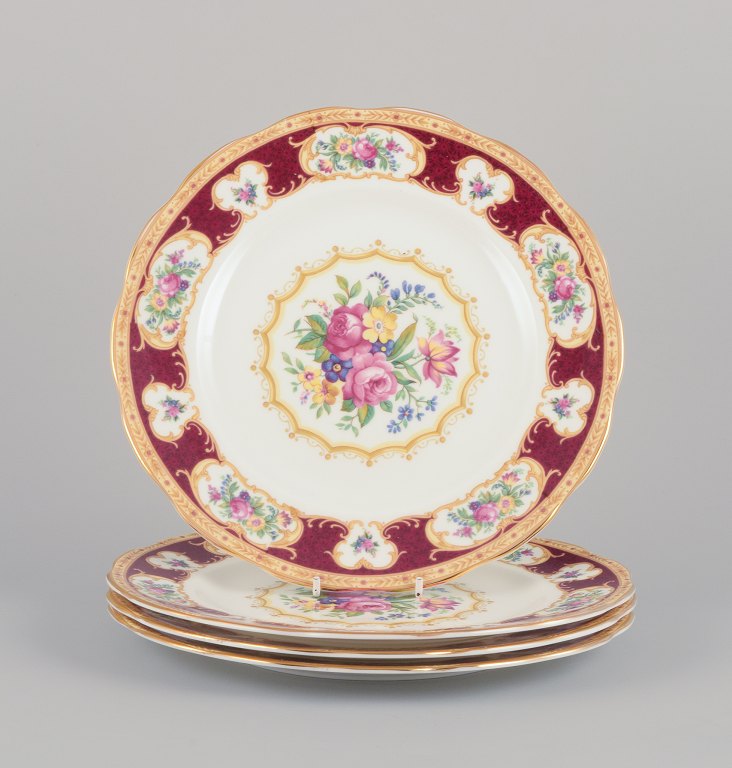 Royal Albert, England. A set of four "Lady Hamilton" dinner plates with polychrome floral motifs. Gold decoration.