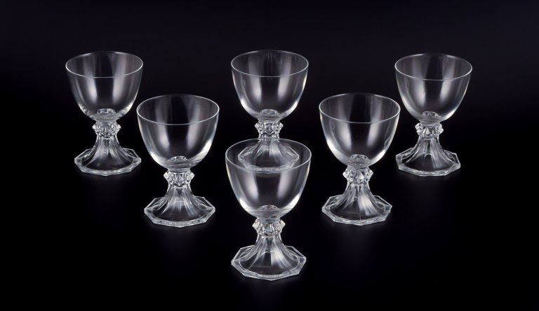 Val St. Lambert, Belgium. A set of six red wine glasses in clear mouth-blown crystal glass.