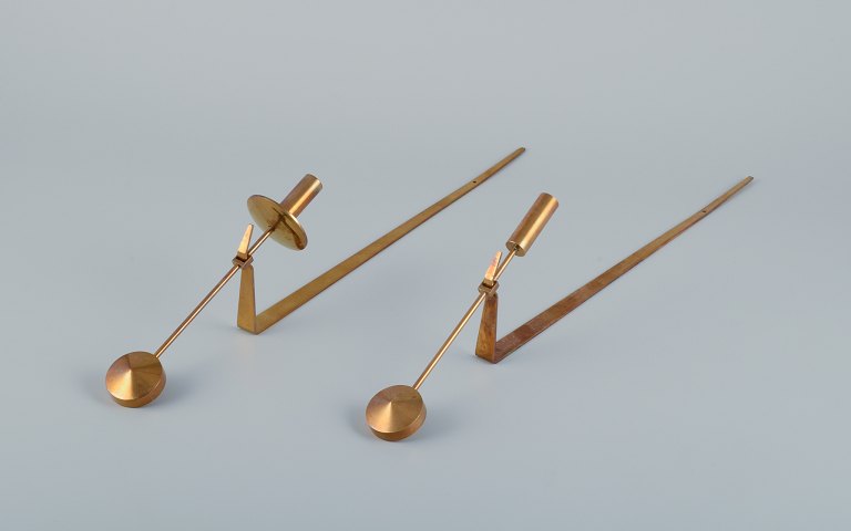 Skultuna, Sweden. A pair of "Lampett Pendel" wall-mounted candle sconces in brass.