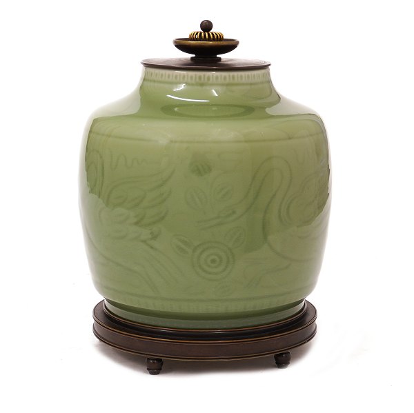 Celadon glazed lidded jar by Georg Thylstrup for Royal Copenhagen #2499. Bronze base and lid by Knud Andersen. Nice condition. H: 22cm