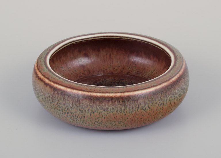 Carl Harry Stålhane (1920-1990) for Rörstrand. Low ceramic bowl with brown and green glaze.