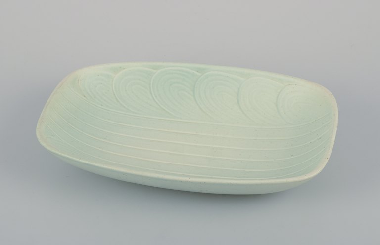 Rörstrand, Sweden. Large ceramic bowl in a modernist design. Rare model. Glaze in light green tones.