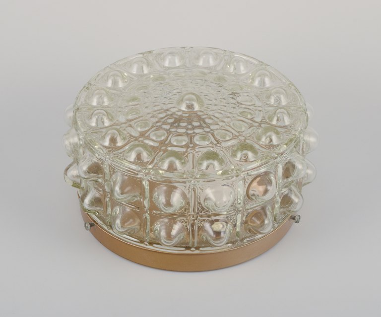 Helena Tynell, Finnish glass artist, for Limburg.Designer wall/ceiling lamp in clear glass and metal.