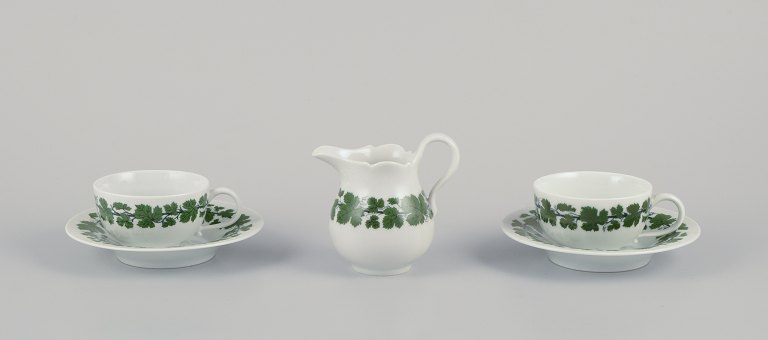Meissen, Germany, Green Ivy Vine, two coffee cups with matching saucers and a creamer.