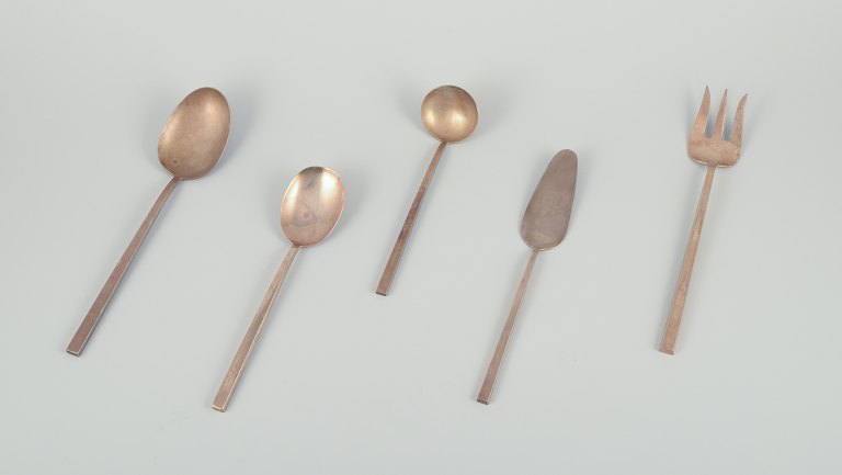 Sigvard Bernadotte "Scanline" brass flatware.Five pieces of serving utensils.