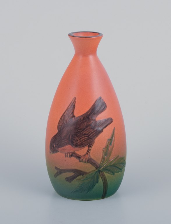 Ipsens, Denmark, ceramic vase, motif of a bird on a branch. Glaze in green and orange tones.
