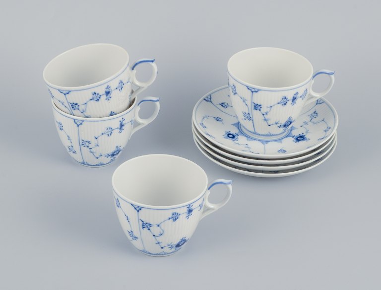 Royal Copenhagen Blue Fluted Plain, four coffee cups with saucers. Rare cup in an extra-large size.