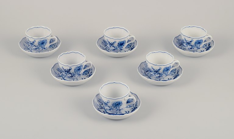 Meissen, Germany.A set of six Blue Onion pattern demitasse cups with saucers.