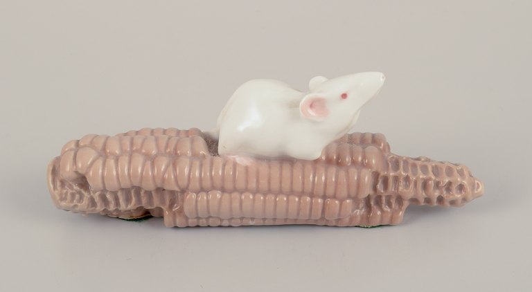 Royal Copenhagen, Denmark.Porcelain figurine of a mouse on a corn cob.