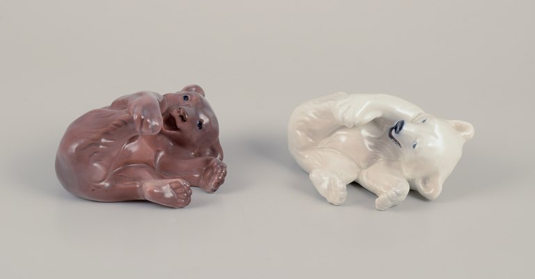 Royal Copenhagen, Denmark.Two porcelain figurines of a polar bear cub and a brown bear cub.