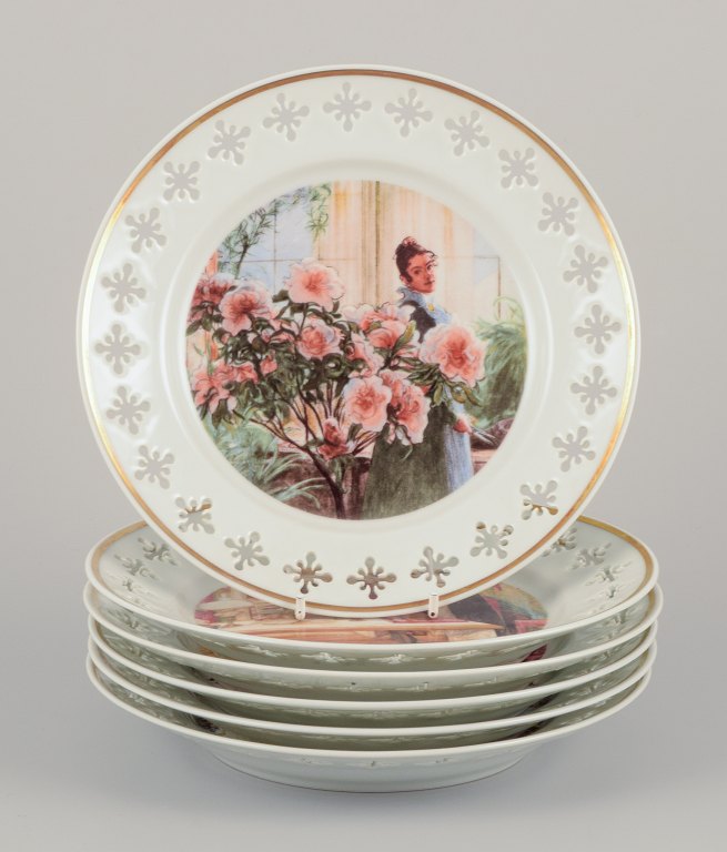 Bing & Grøndahl, Denmark. A set of six porcelain plates featuring motifs from Carl Larssons paintings.