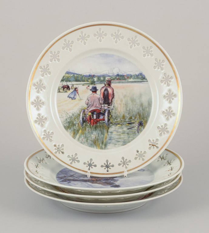 Bing & Grøndahl, Denmark. A set of four porcelain plates featuring motifs from Carl Larssons paintings.
