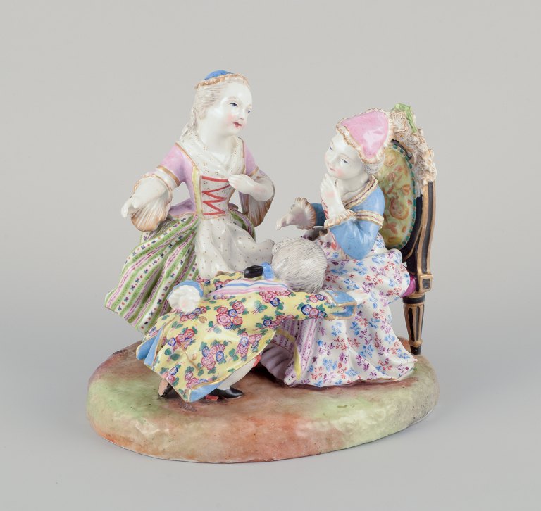 Meissen, Tyskland.Large and impressive figurine group of three people in fine clothing.