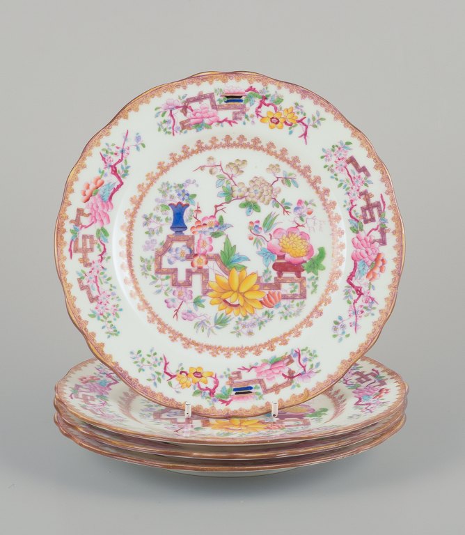 Mintons, England.Set of four lunch plates in faience.