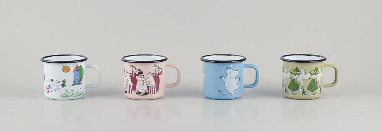 Muurla, Finland. Four enamel mugs with different motifs from the Moomin troll universe.