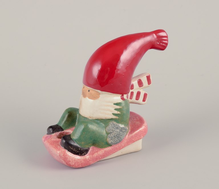 Lisa Larson for Gustavsberg.Candlestick holder. Elf on sled.