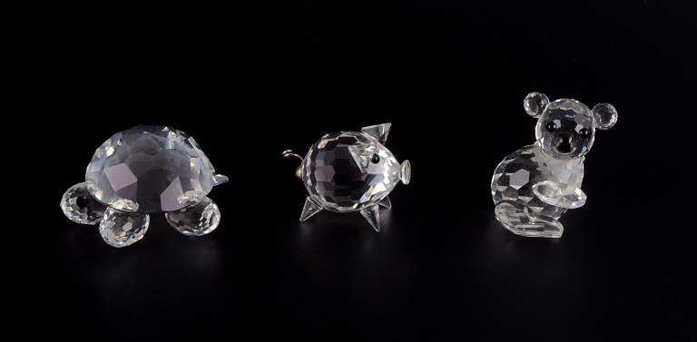 Swarovski, Austria.Three miniature figurines in faceted cut crystal glass.