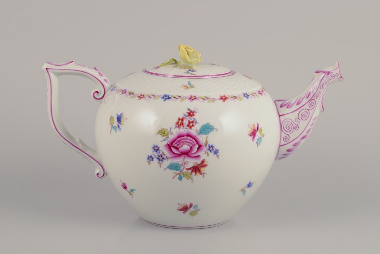 Herend, large porcelain teapot. Lid with flower bud.Hand-painted with polychrome floral motifs.