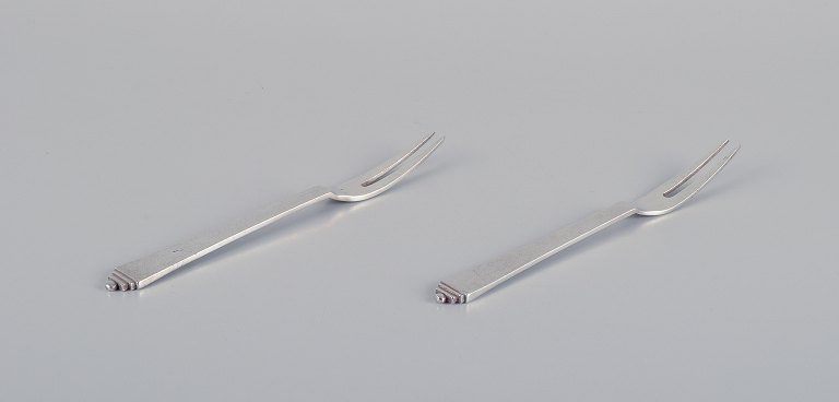 Georg Jensen Pyramid.Two cold meat forks in sterling silver.