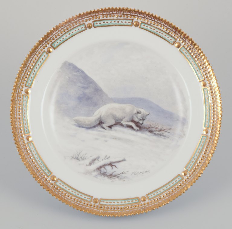 Royal Copenhagen Fauna Danica, hand-decorated dinner plate featuring a motif of an arctic fox.