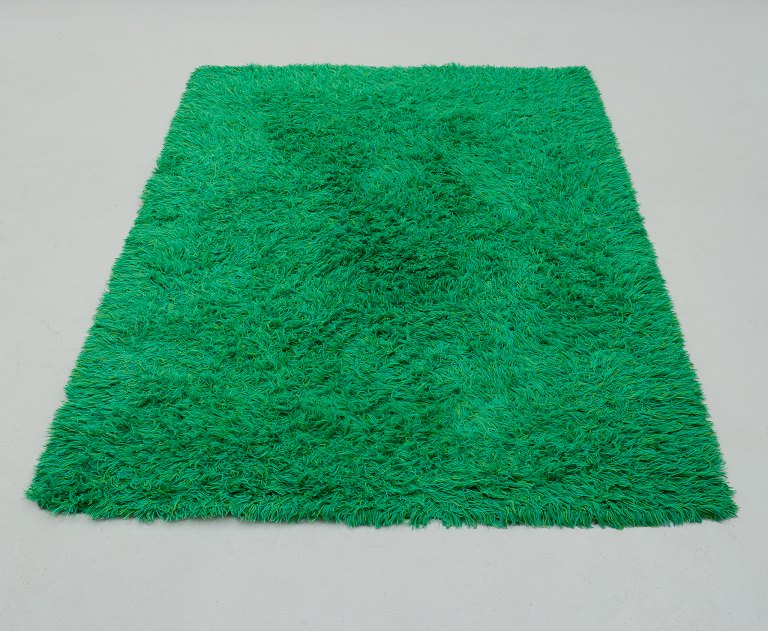 Scandinavian textile designer.Rya carpet in pure cotton.