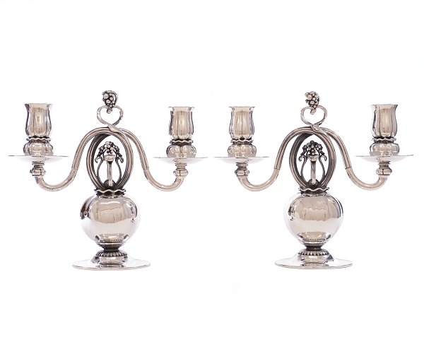 Pair of early Georg Jensen sterlingsilver candelabra 324. Designed 1919. H: 22cm. W: 25cm. W: 2.085gr
