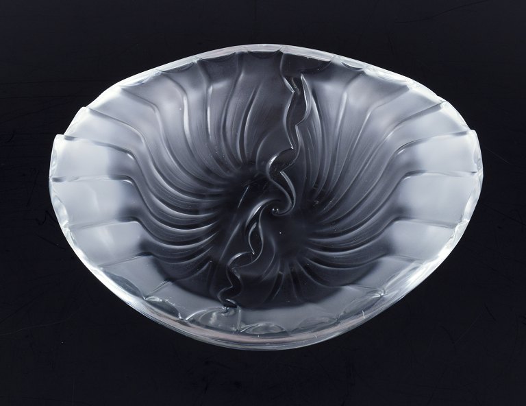 Lalique, France. Art glass bowl with relief decoration.