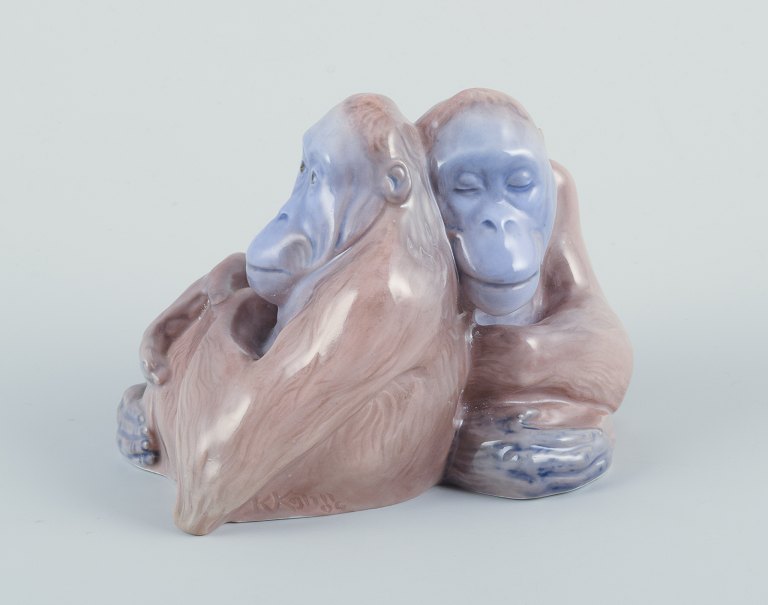 Knud Kyhn for Royal Copenhagen.Rare porcelain figurine of two orangutans.