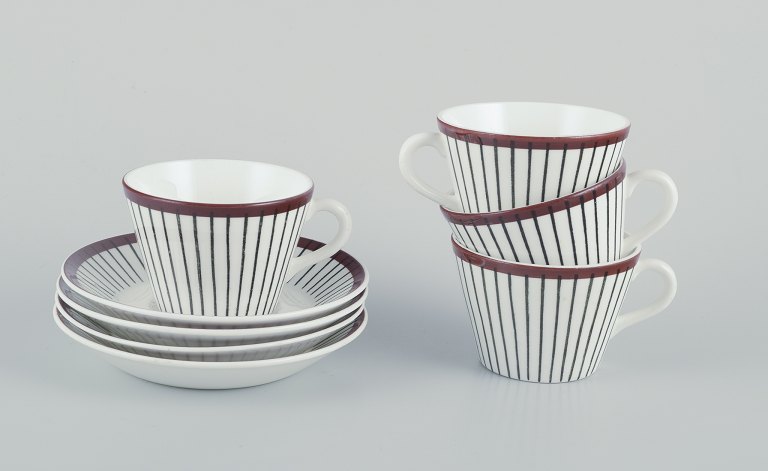 Stig Lindberg for Gustavsberg.A set of four ‘Spisa Ribb’ coffee cups and saucers in porcelain.