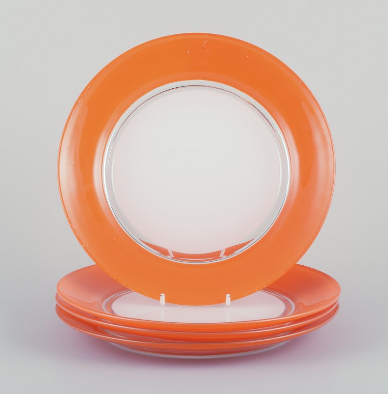 Duralex, France.A set of four art glass plates in orange and white glass.