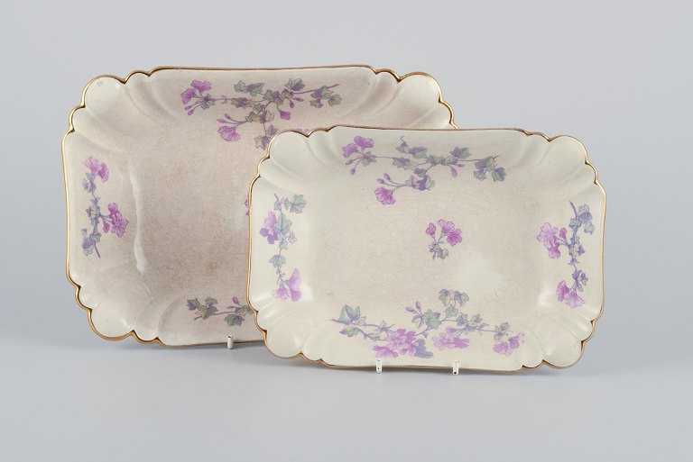 Gustafsberg, Sweden.Two elongated and deep "Geranium" faience dishes.