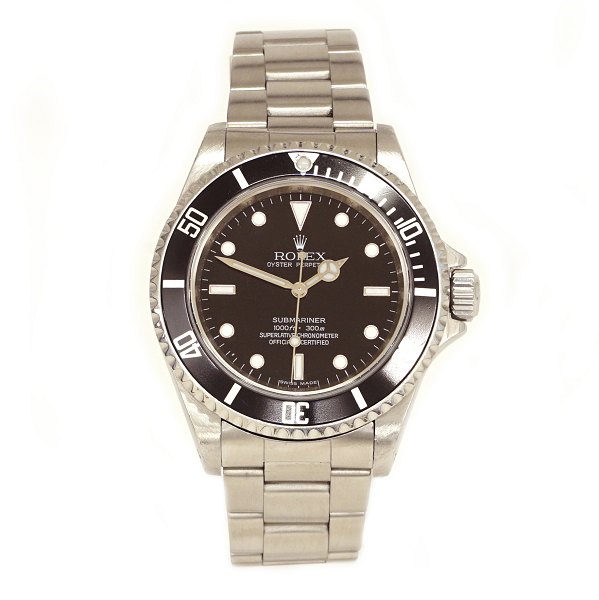 Rolex Submariner ref. 14060M. Solgt første gang 20.08.2010 af Wempe Hamborg. Serviceret af Bucherer februar 2022. Leveres med boks, certifikat og øvrigt tilbehør. D: 40mm