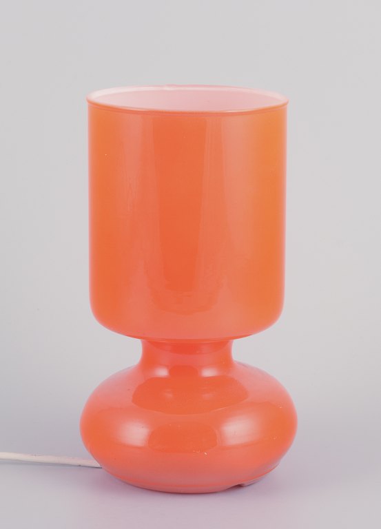 Scandinavian designer, table lamp in orange glass.