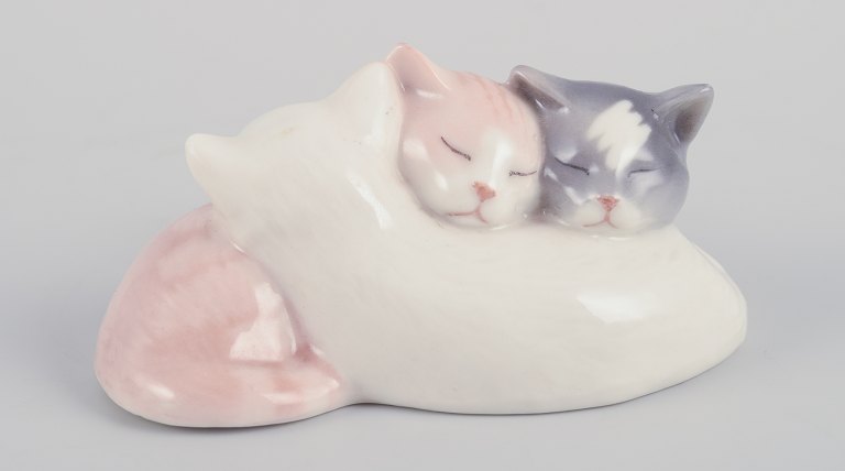 Royal Copenhagen. Porcelain figurine of three sleeping kittens.