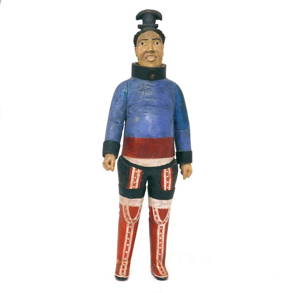 Johannes Kreutzmann figur. Johannes Kreutzmann, 1862-1940, figur af træ forestillende gravid grønlandsk kvinde. Hjembragt af Knud Rasmussen. H: 44cm