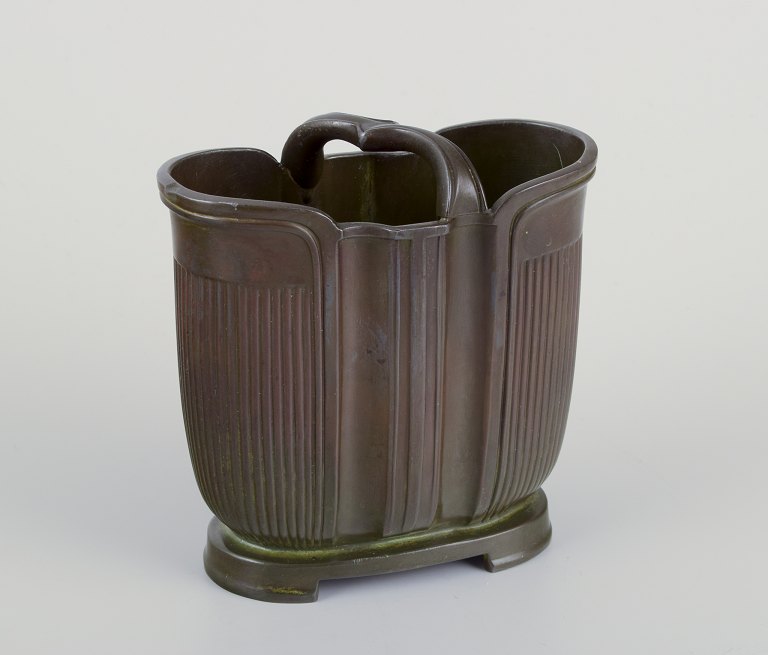 Just Andersen, Denmark.Art Deco vase on foot with handle.