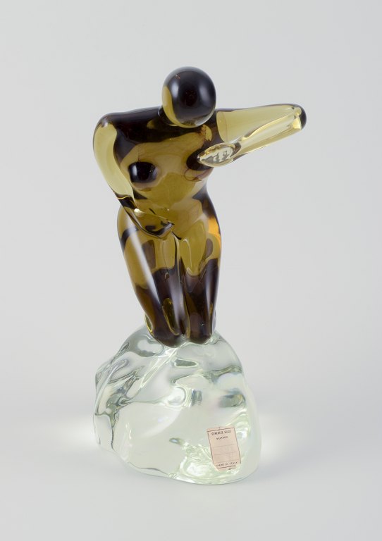 Cenedese, Murano, Italy.Large sculpture made of art glass. Nude woman on rock.