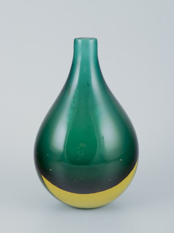 Murano, Italy.Vase in green art glass. Chubby shape.