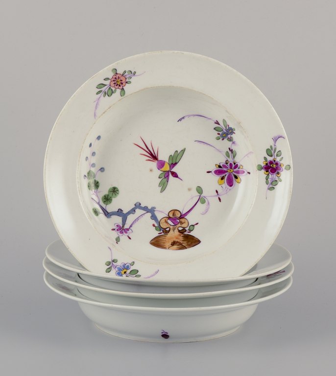 Meissen, Germany. A set of four antique porcelain soup plates.Hand-painted, ‘Kakiemon’ decoration.